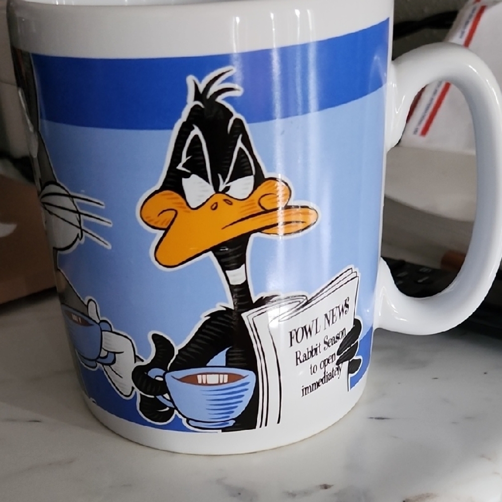 Playful Cartoon Character Mug in Blue and White